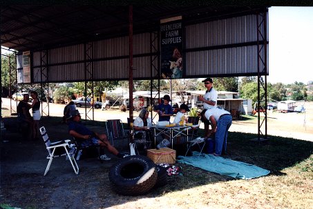 Members sitting in the shade having lunch
